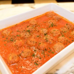 Braised beef meat balls in tomato basil sauce