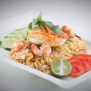 Fried jasmine rice with Prawns, chicken, tomatoes and fried egg