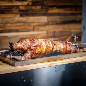 Roasted Whole Baby Lamb with Baked Potatoes and Giblets Rice